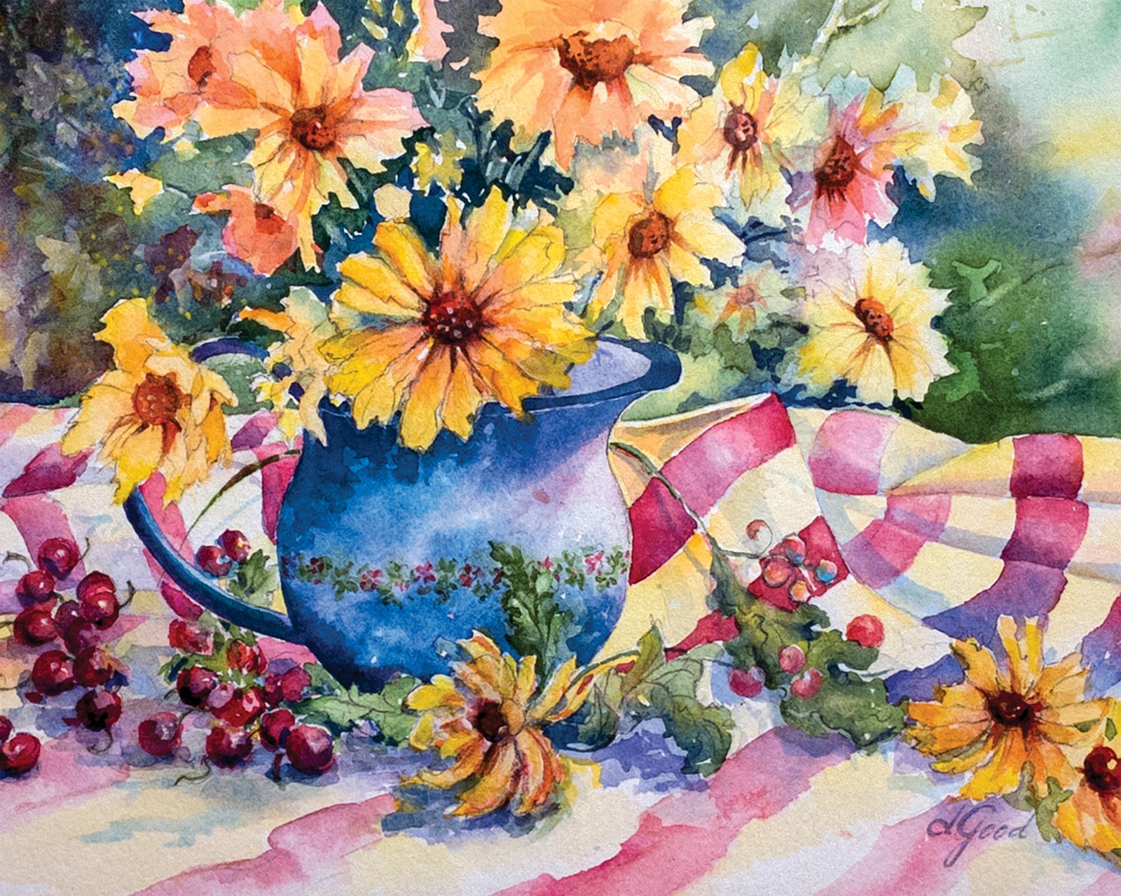 A blue jug of yellow flowers joins red cherries and patterned linen on the table.