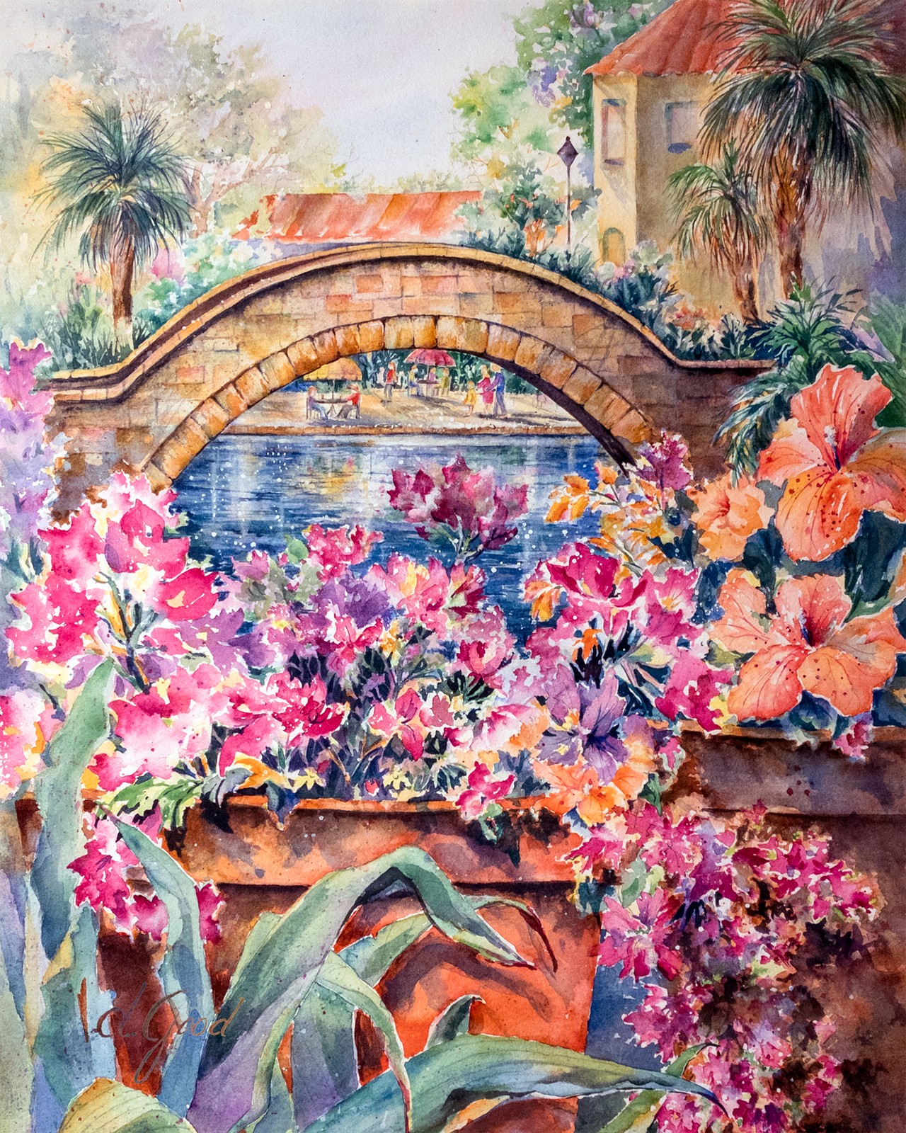 Vivid pink flowers and tropical leaves frame an arched bridge on the San Antonio River Walk.